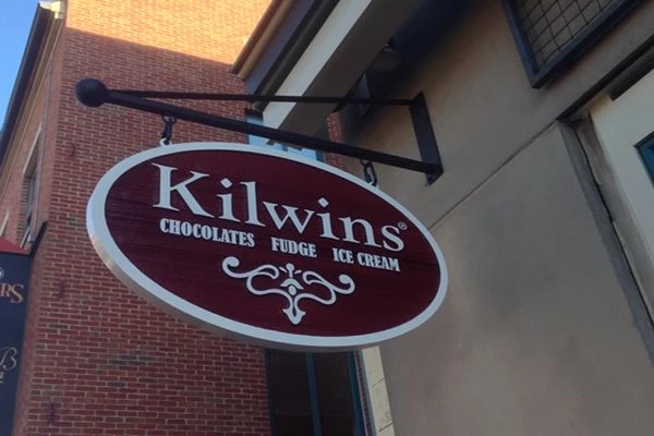 3D Carved wooden blade sign for Kilwins in Fells Point Baltimore, MD